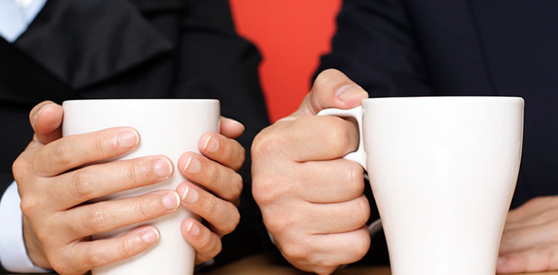 Two people enjoying a cup of coffee together