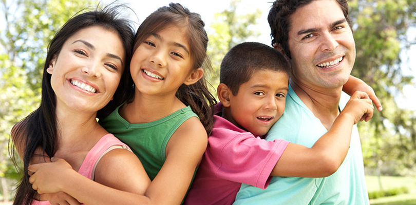 A young looking family is enjoying their family time together