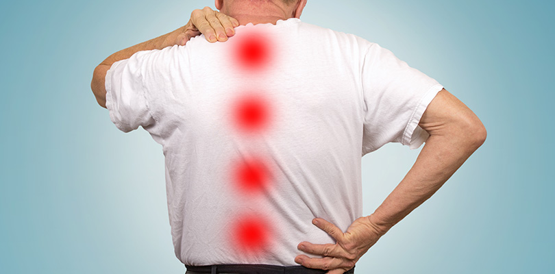 A man is experiencing spinal stenosis pain
