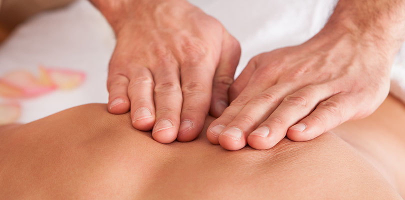 A person is receiving acupressure