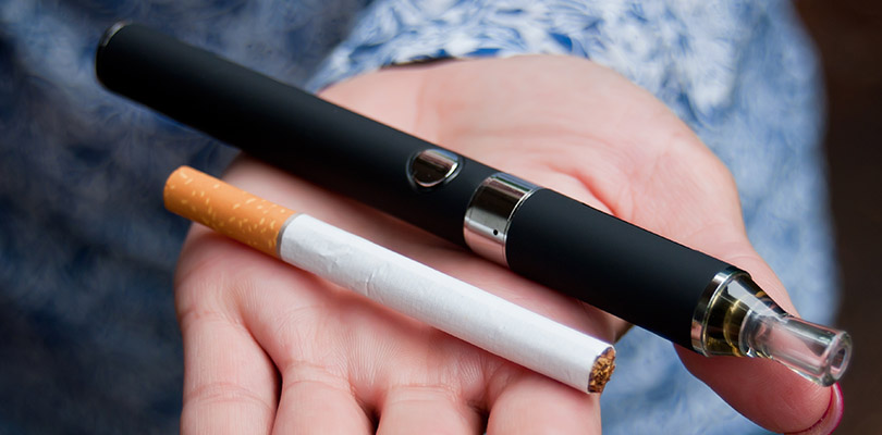 A cigarette and vaporizer (or e-cigarette)