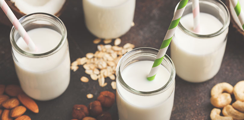 Vegan alternative nut milk in glass bottles