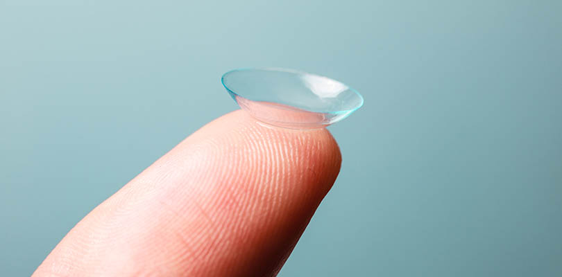 Contact lens balance on the tip of index finger